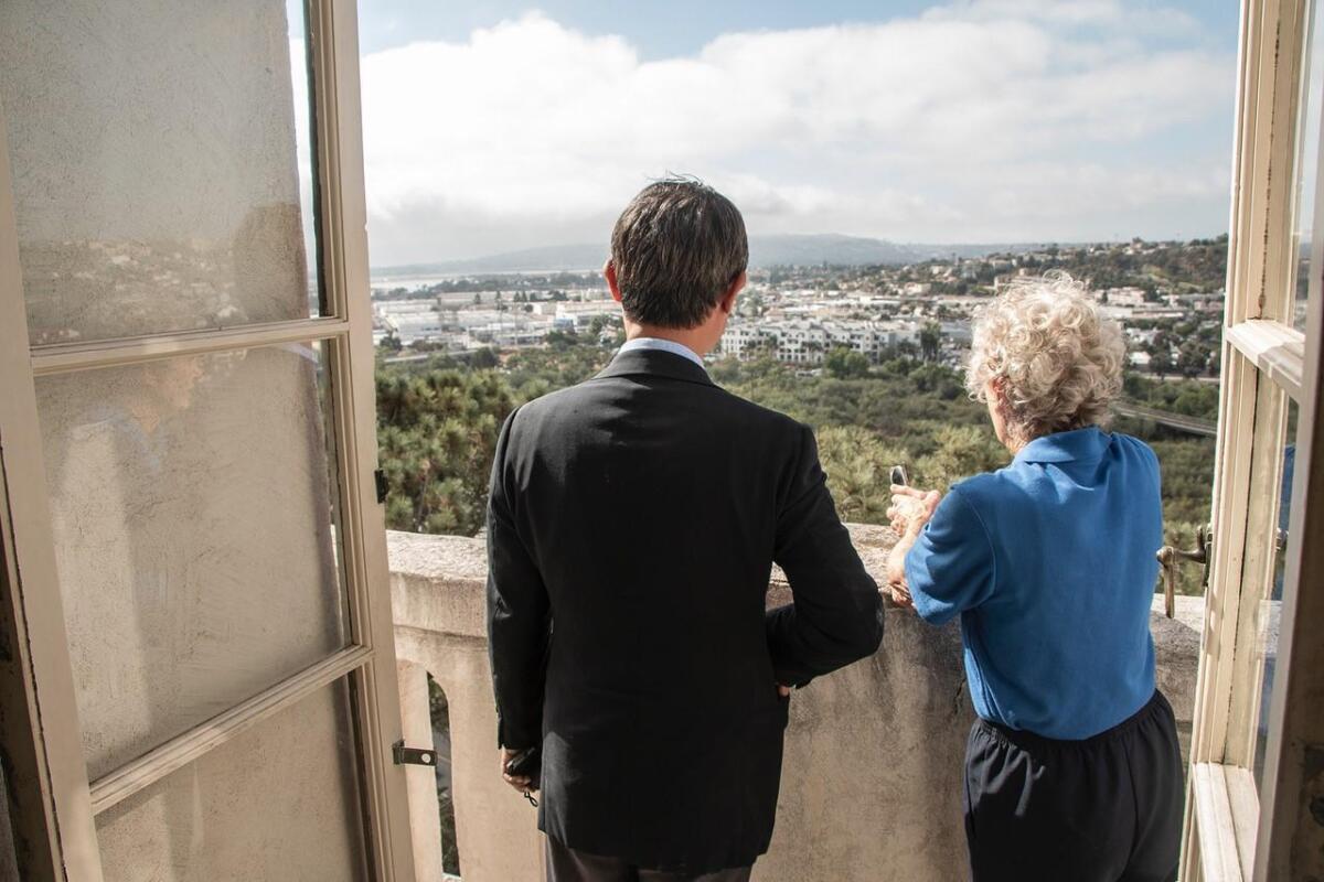 Visitors admire views of the San Diego River from the top floor of the Junípero Serra Museum on July 16, 2019.