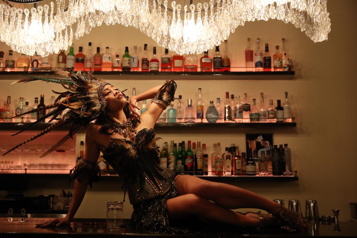 Mizon Garde pauses for a portrait at Genever, where she performs in an all-Filipina burlesque show called "Burlesque Las FilipinX."