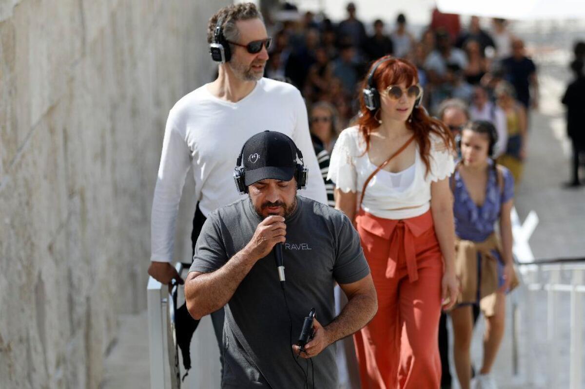 Composer Murray Hidary, the founder of MindTravel Music, leads participants through the Getty. "My mission is to move people to greater purpose in their lives through music,” he says.