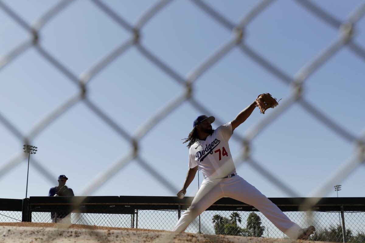 Dodgers relief pitcher Kenley Jansen throws during spring training on Feb. 20 in Phoenix.