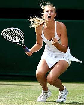 Russian Maria Sharapova celebrates her victory today over American Lindsay Davenport at Wimbledon.