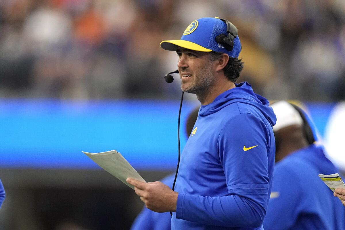 Rams quarterbacks coach Zac Robinson stands on the sideline during a game against the Cleveland Browns on Dec. 3.