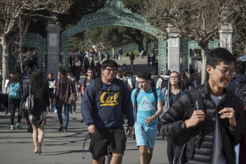 Students play and study around the campus of the University of California at Berkeley in 2017.