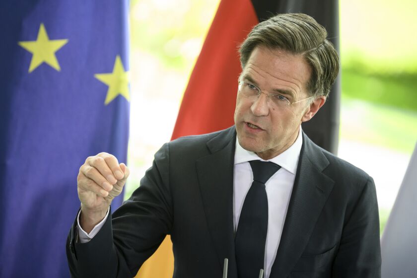 Mark Rutte, Prime Minister of the Netherlands, makes remarks at a press conference with Chancellor Scholz after the meeting of the German-Dutch Climate Cabinet at the Federal Chancellery in Berlin, Germany, Tuesday, Oct. 4, 2022. (Bernd von Jutrczenka/dpa via AP)