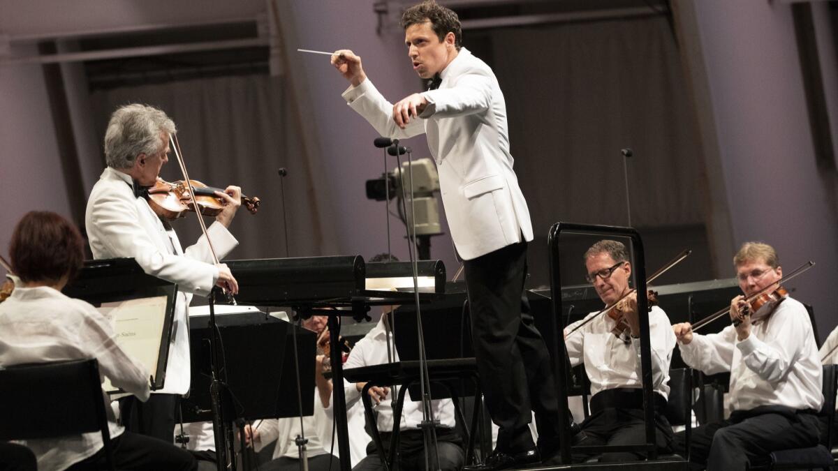 Paolo Bortolameolli, the L.A. Phil's assistant conductor, makes his Hollywood Bowl debut on Thursday night, with Martin Chalifour as soloist.