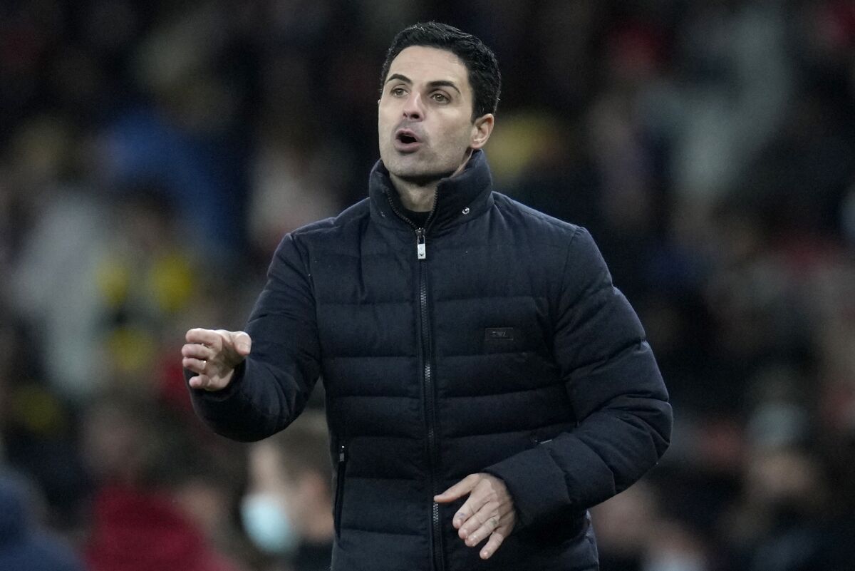 Arsenal's manager Mikel Arteta gestures during the English League Cup quarterfinal soccer match between Arsenal and Sunderland at Emirates stadium in London, Tuesday, Dec. 21, 2021. (AP Photo/Kirsty Wigglesworth)