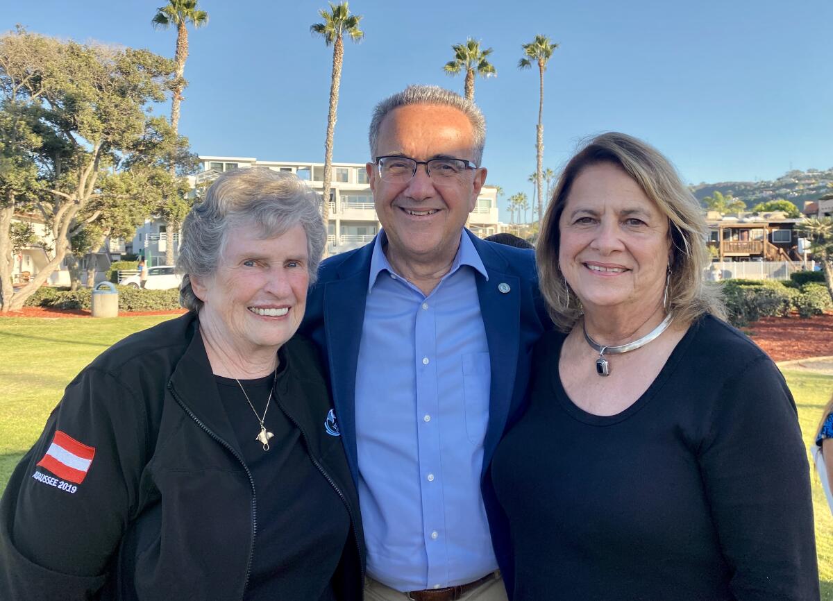 Mary Coakley Munk, San Diego City Councilman Joe LaCava and Ann Kerr Bache celebrate the late Walter Munk's birthday. 