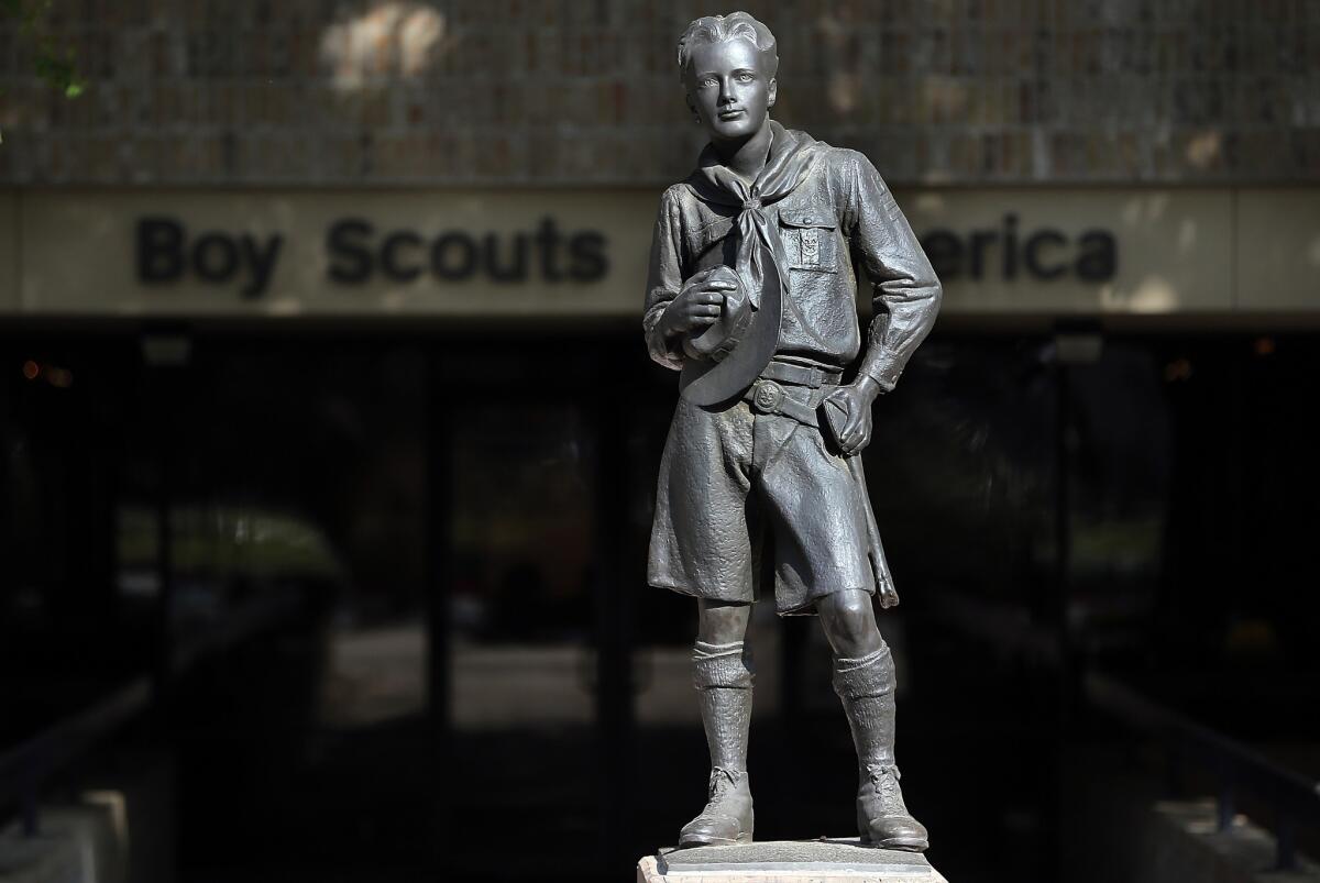 The Boy Scouts of America is conducting a survey of attitudes toward its ban on membership for gays. This statue appears outside the group's headquarters in Irving, Texas.