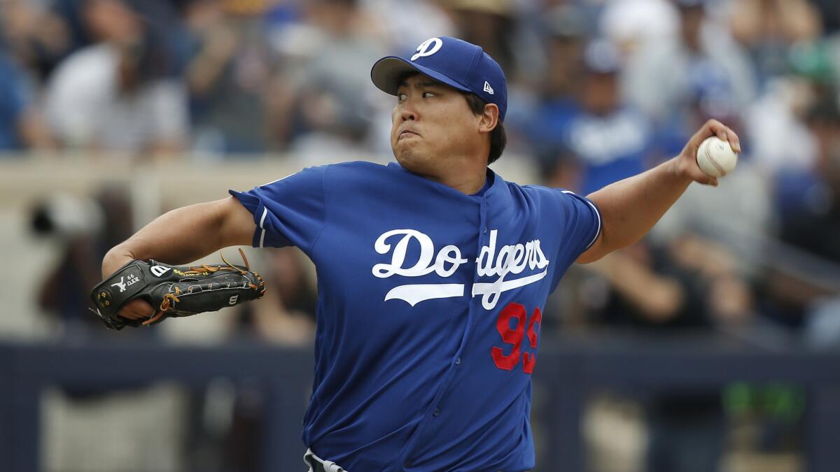 Dodgers pitcher Hyun-Jin Ryu delivers during an exhibition game against the Milwaukee Brewers on Thursday.