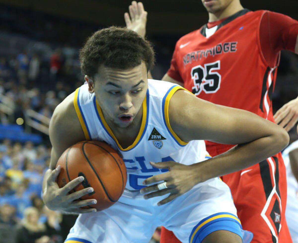 UCLA freshman Kyle Anderson pulls down a rebound against Cal State Northridge.