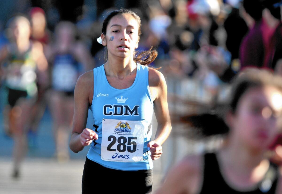 Raquel Powers (285) and the Corona del Mar High girls' cross-country team is in the first race in the CIF State Championships, Division 3.