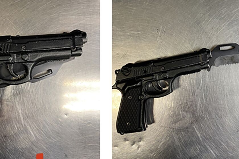 This photo combination provided by the Los Angeles Police Department shows the fake handgun with the real knife blade inside that was taken from the man who attacked comedian Dave Chappelle at the Hollywood Bowl, Tuesday, May 2, 2022. Security guards overpowered the attacker, Isaiah Lee, 23, who was detained and arrested for assault with a deadly weapon. Chappelle was able to continue his performance.(Los Angeles Police Dept. via AP)