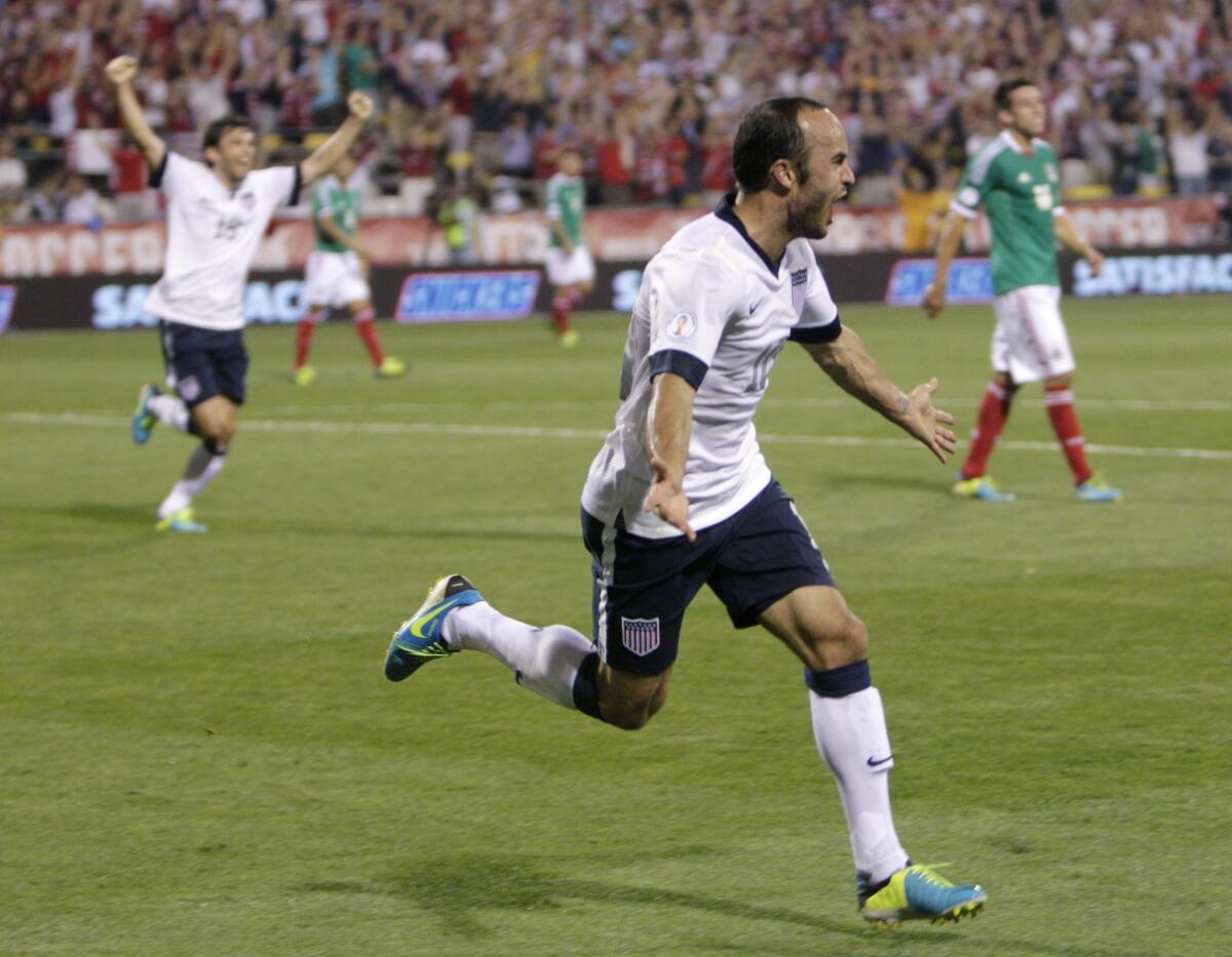 Landon Donovan celebrates after scoring in the second half of the United States' 2-0 win over Mexico in a World Cup qualifying match on Tuesday.