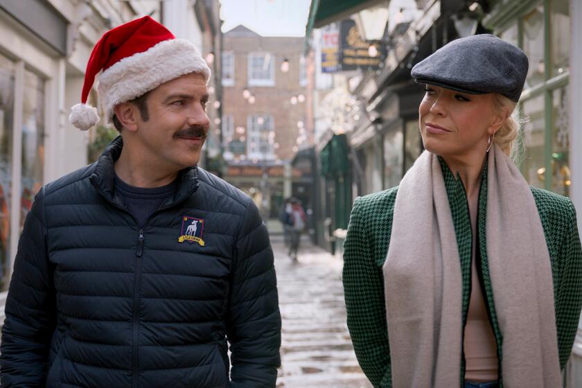 Jason Sudeikis and Hannah Waddingham in “Ted Lasso” season two, now streaming on Apple TV+.