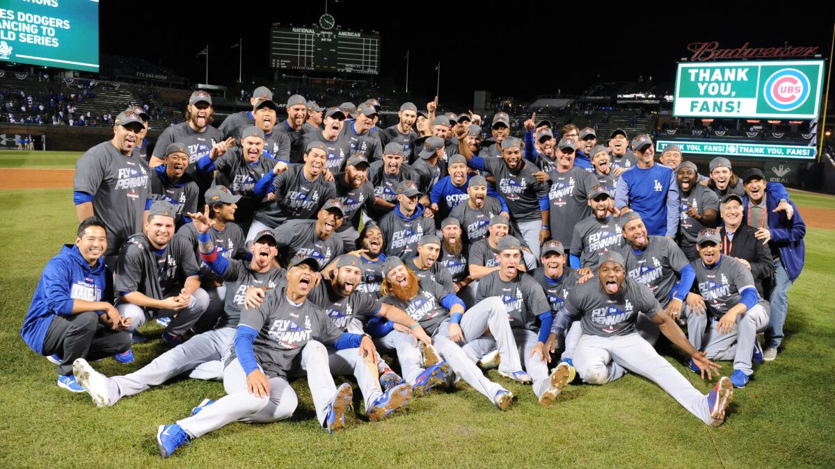 Dodgers players celebrate the National League pennant after defeating the Chicago Cubs in the NLCS in 2017.