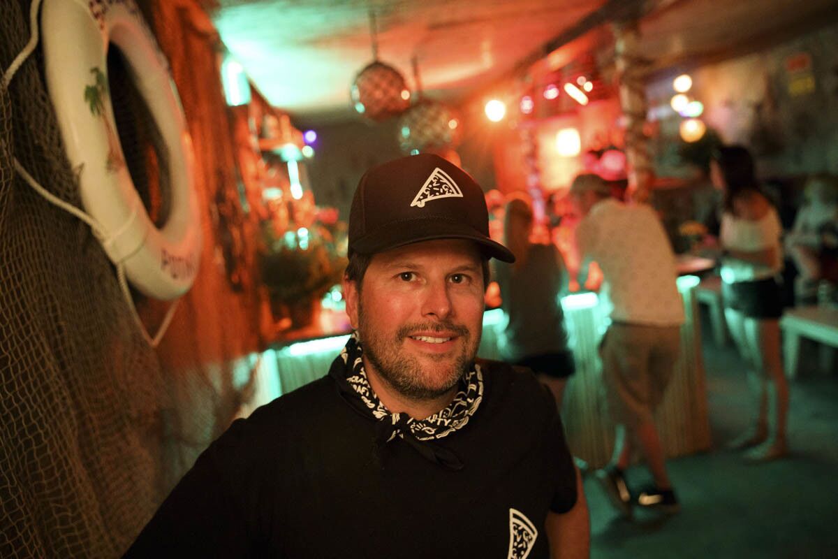 Nic Adler, culinary director of Coachella, stands for a portrait inside of the secret tiki bar PDTiki during weekend one of the three-day Coachella Valley Music and Arts Festival at the Empire Polo Grounds on Saturday, April 15, 2017 in Indio, Calif. Goldenvoice food and beverage director Nic Adler teamed with the bartenders at PDT (Please Don't Tell) in Manhattan, New York, to open a 35-person bar in the general admission area. An assortment of restaurants and chefs are providing unique food and crafted drink options for the festival. (Patrick T. Fallon/ For The Los Angeles Times)