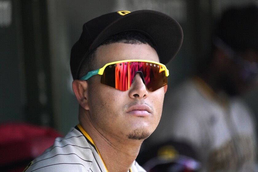 Padres third baseman Manny Machado looks out from the dugout during a game at Wrigley Field.