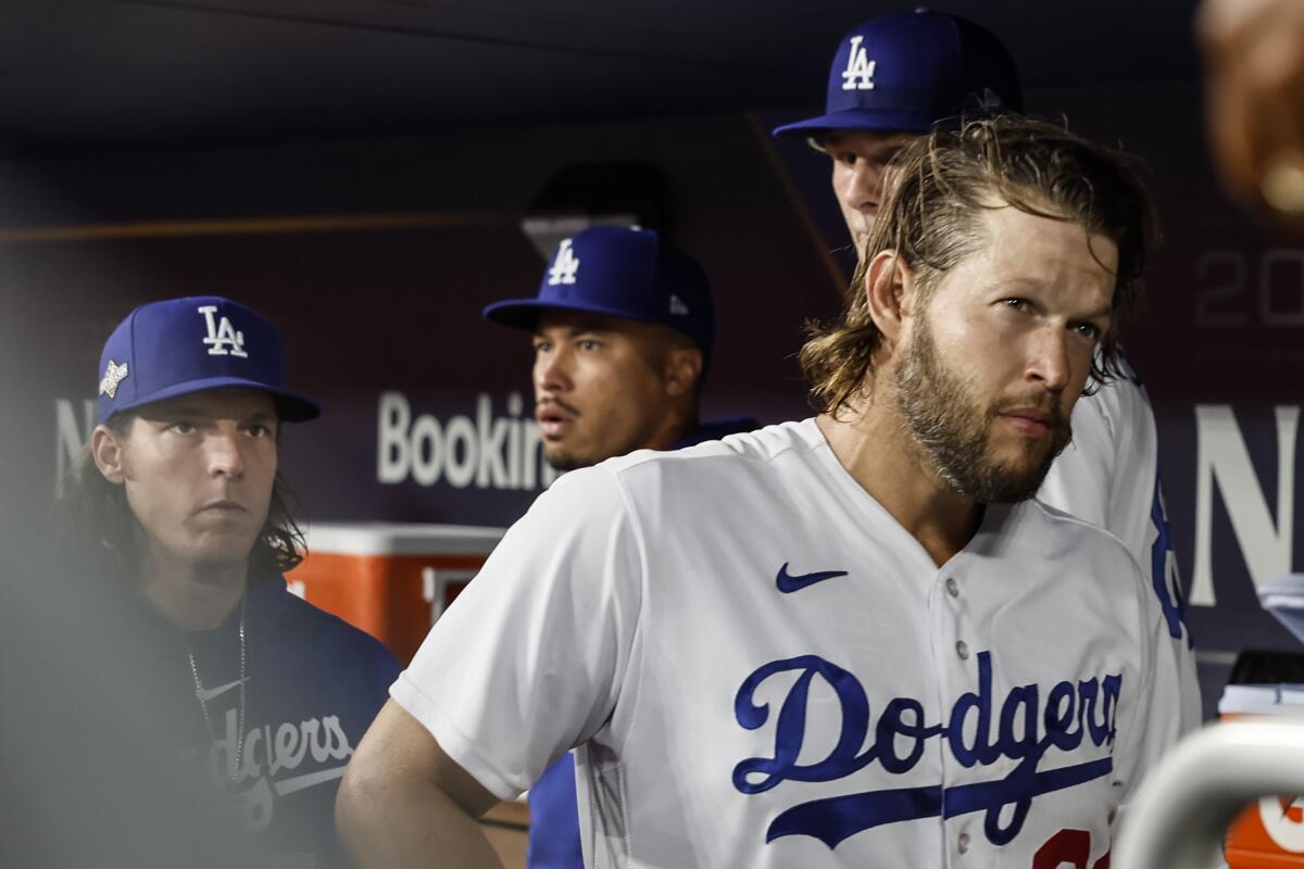Dodgers pitcher Clayton Kershaw leaves the dugout after a disastrous first inning against the Arizona Diamondbacks.