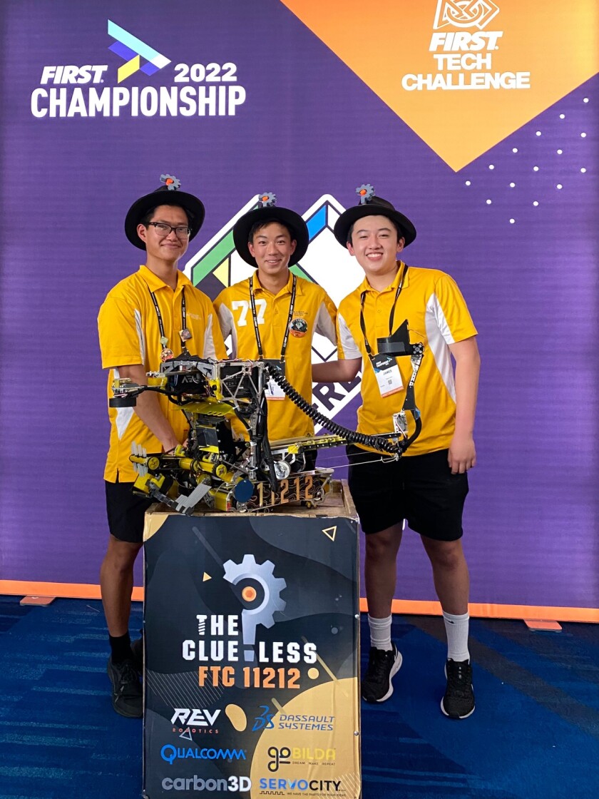 Bishop's School students Nicholas Liu, Michael Zeng and James Hou attend the First World Championship in robotics April 23.