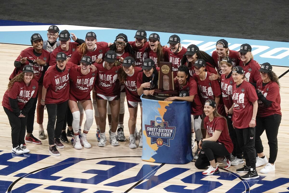 Stanford celebrates after an NCAA college basketball game against Louisville in the Elite Eight round of the Women's NCAA tournament Tuesday, March 30, 2021, at the Alamodome in San Antonio. Stanford won 78-63 to advance to the Final Four. (AP Photo/Morry Gash)
