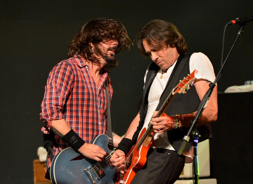 Dave Grohl, left, and Rick Springfield perform at Citi Presents Sound City Players Live at SXSW at Stubb's.