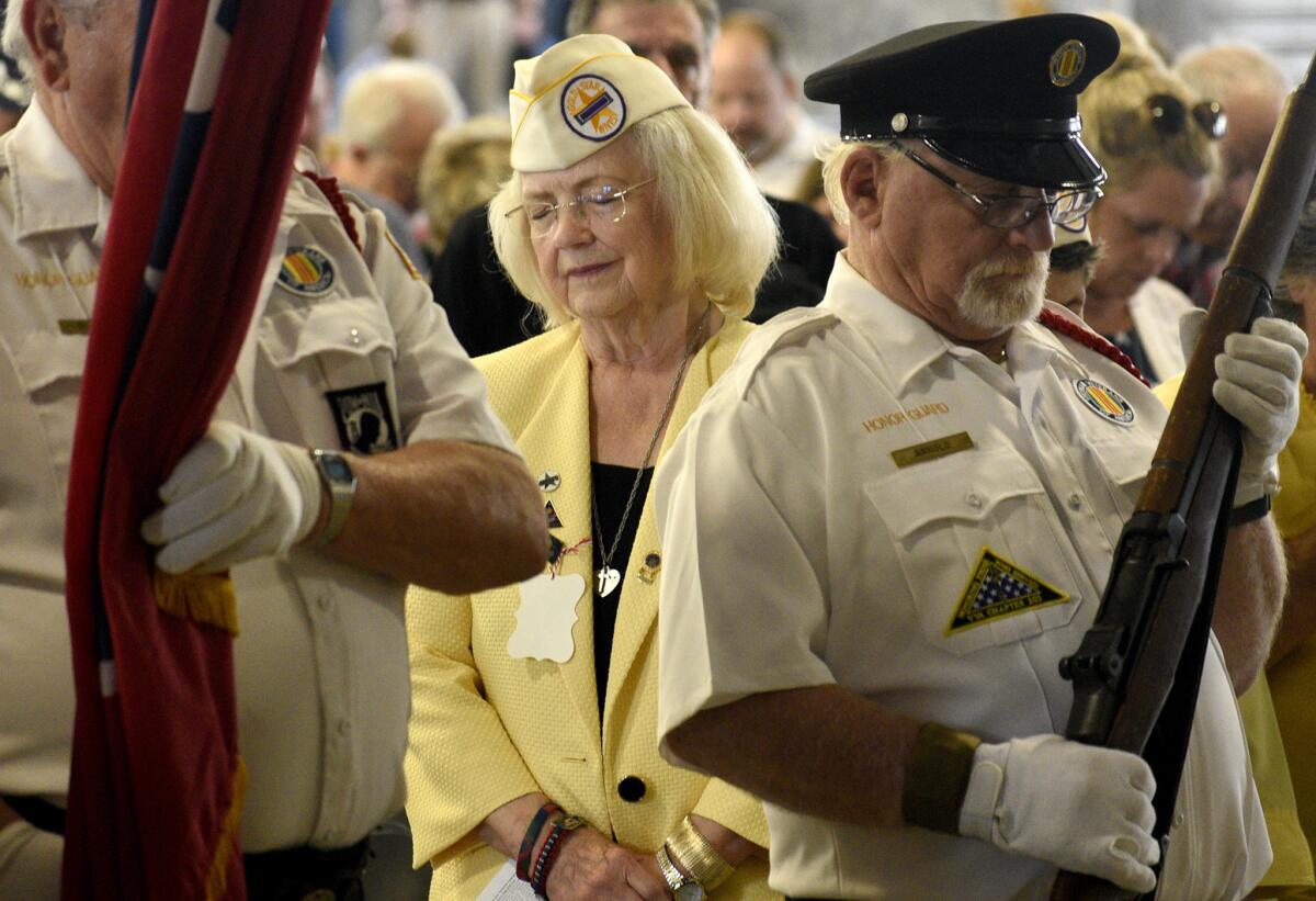Gold Star Wife Bonnie White attends a Memorial Day observance at the National Guard Armory in Chattanooga, Tenn.