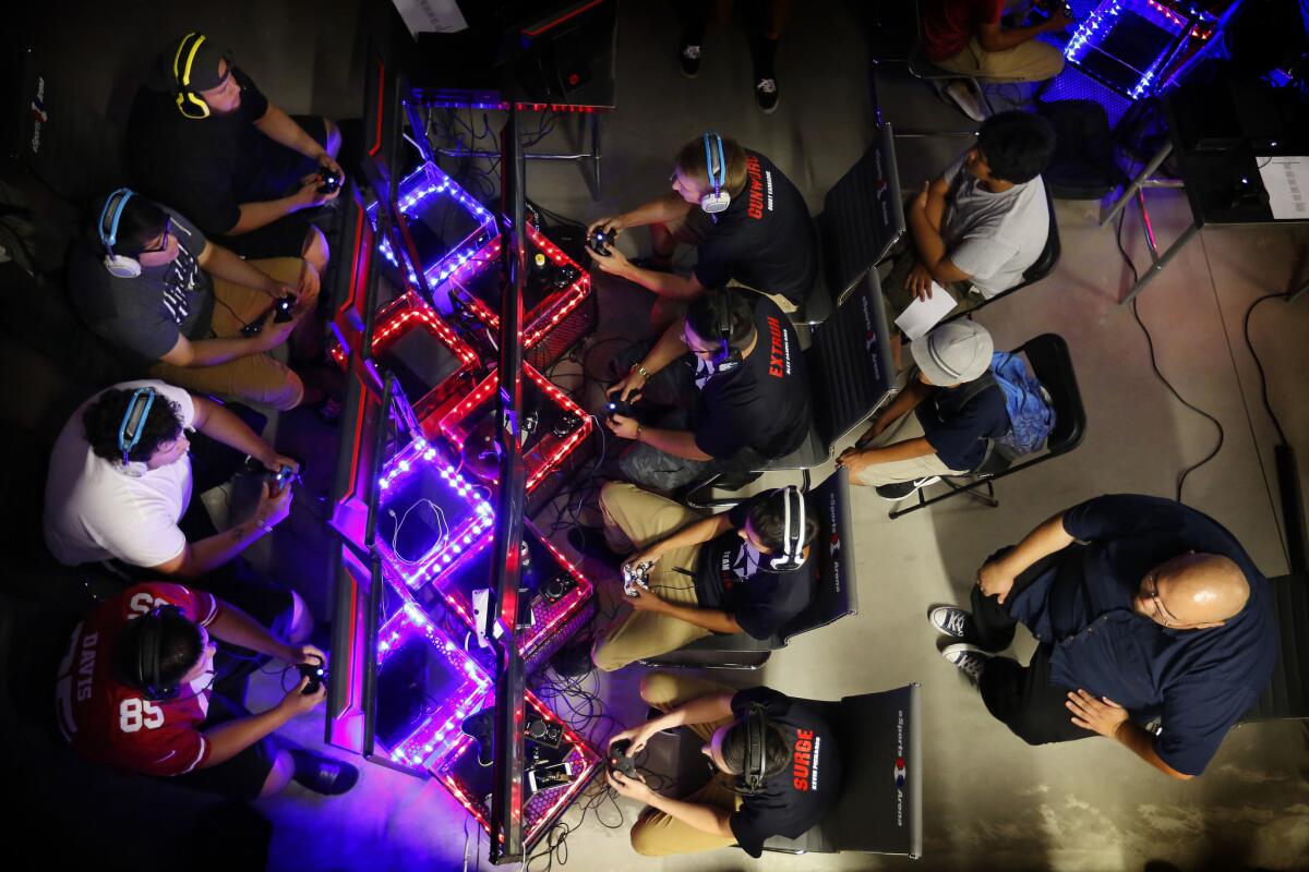 Players engage in a "Call of Duty" tournament at ESports Arena in downtown Santa Ana last August.