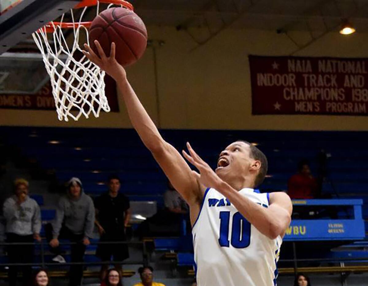 Wayland Baptist guard J.J. Culver shoots during an NAIA college basketball game against Southwestern Adventist on Dec. 10 in Plainview, Texas.