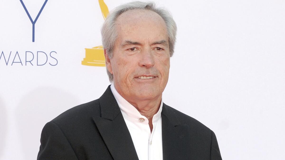 Powers Boothe arrives at the 64th Primetime Emmy Awards in Los Angeles on Sept. 23, 2012.