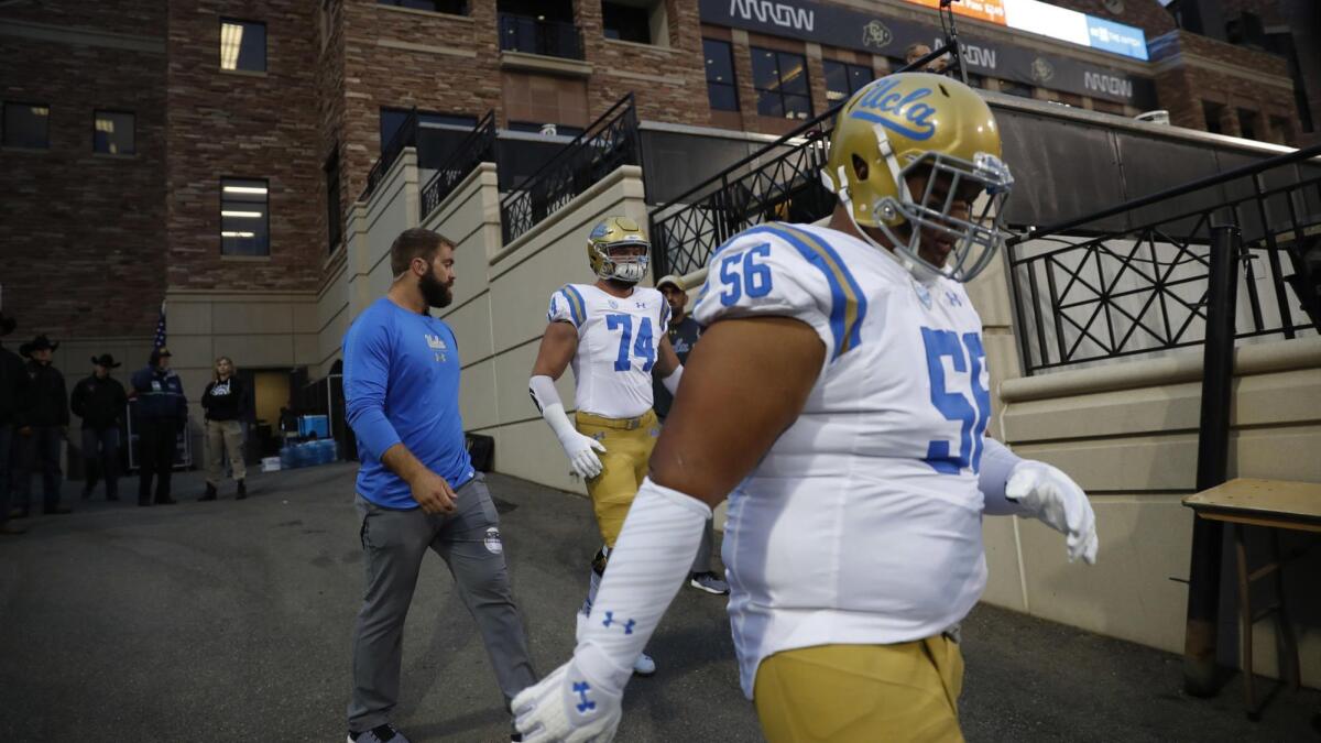 UCLA defensive lineman Atonio Mafi walks onto the field before a game against Colorado in September 2018.