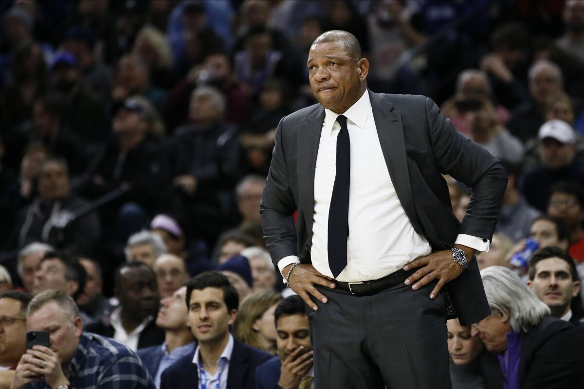 Clippers coach Doc Rivers stares from the sideline during a game against the 76ers on Feb. 11 in Philadelphia.