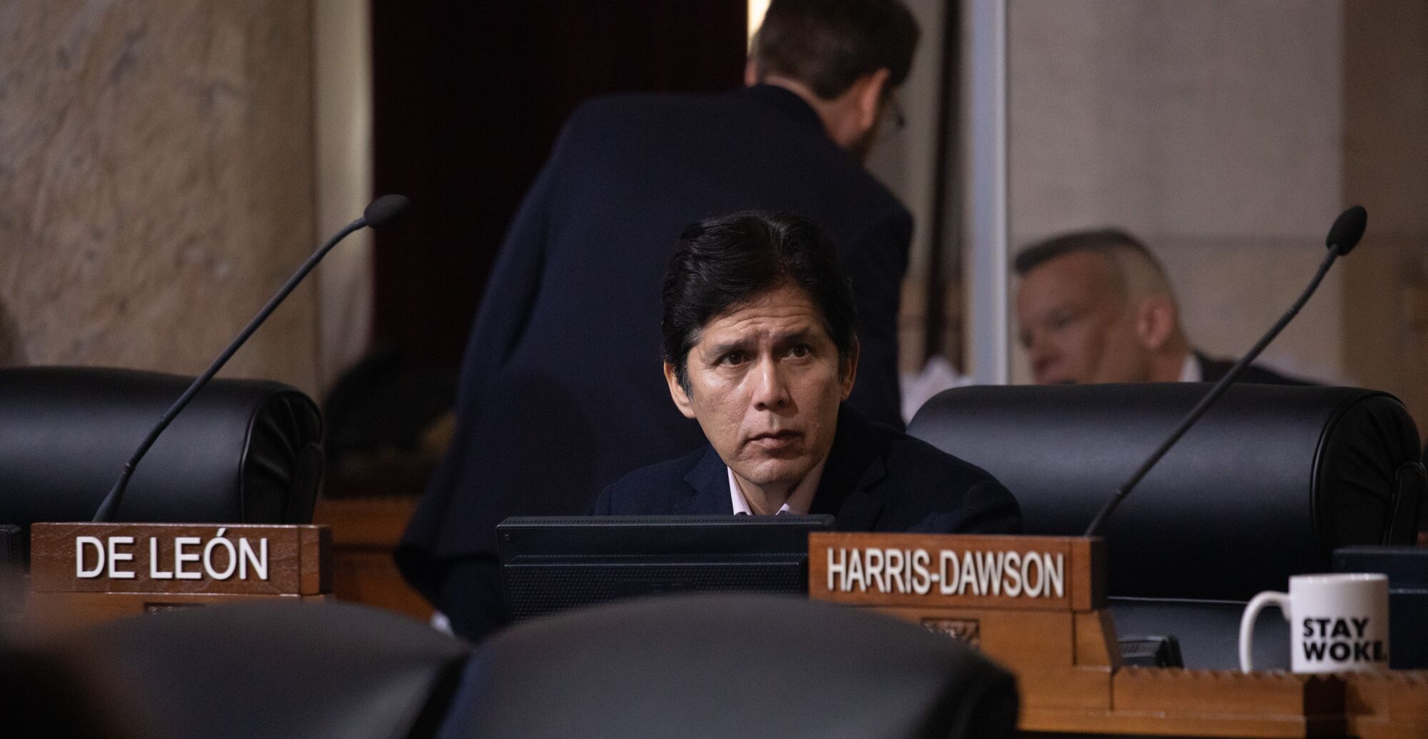 Kevin de León sitting in a meeting with a furrowed brow.
