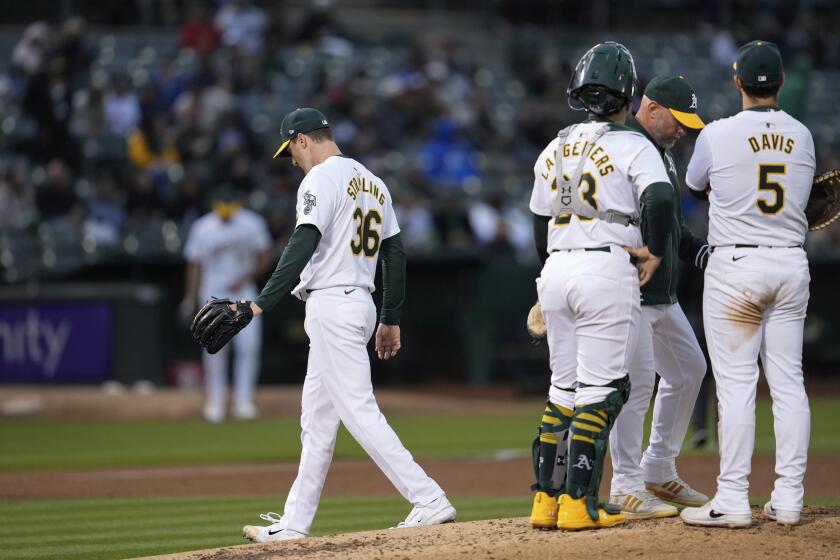 Oakland Athletics pitcher Ross Stripling (36) leaves during the fourth inning of the team's baseball game against the Houston Astros, Friday, May 24, 2024, in Oakland, Calif. (AP Photo/Godofredo A. Vásquez)
