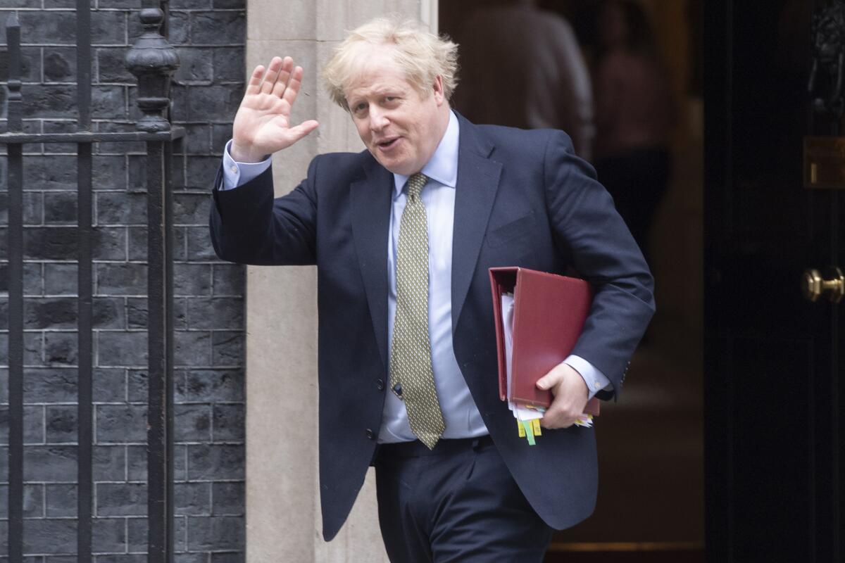 British Prime Minister Boris Johnson leaves 10 Downing St. on March 18, 2020. He is now in intensive care because of COVID-19.