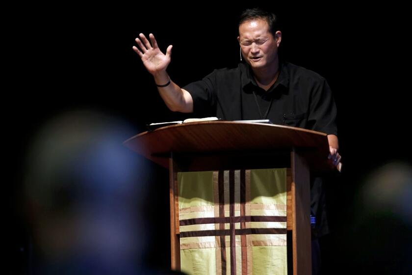 LA PUENTE, CA AUGUST 27, 2017: Pastor Rocky Seto preaching during Sunday morning service at Evergreen SGV Baptist Church in La Puente, CA August 27, 2017. Seto was an assistant coach at USC and then for the Seattle Seahawks. However, he was unfulfilled. So he left the NFL and pursued a new life in the ministry. (Francine Orr/ Los Angeles Times)