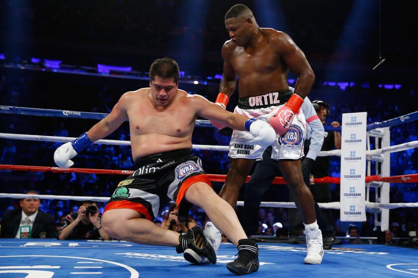 Luis Ortiz knocks down Matias Ariel Vidondo on Oct. 17.