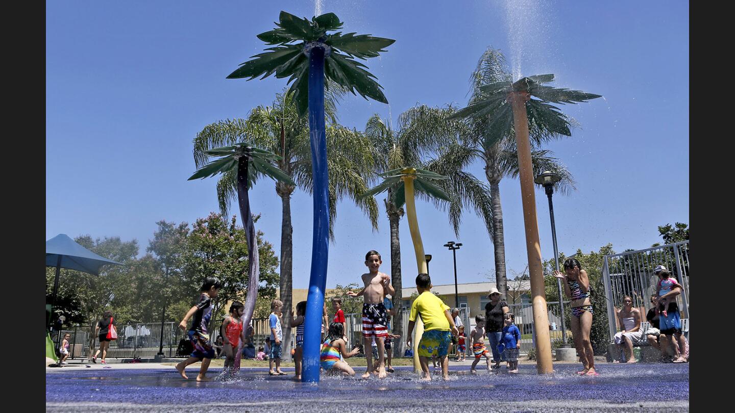 Photo Gallery: Children cool down and fuel up at Pacific Park