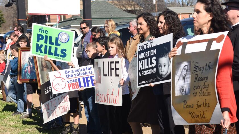 Abortion opponents demonstrate near Planned Parenthood in Tyler, Texas, on Jan. 23, 2017.