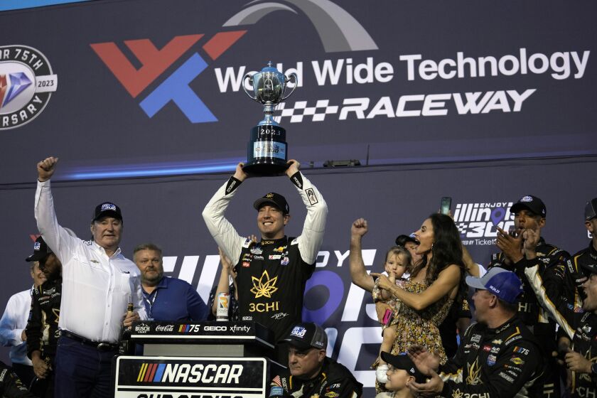 Kyle Busch celebrates after winning a NASCAR Cup Series auto race at World Wide Technology Raceway, Sunday, June 4, 2023, in Madison, Ill. (AP Photo/Jeff Roberson)