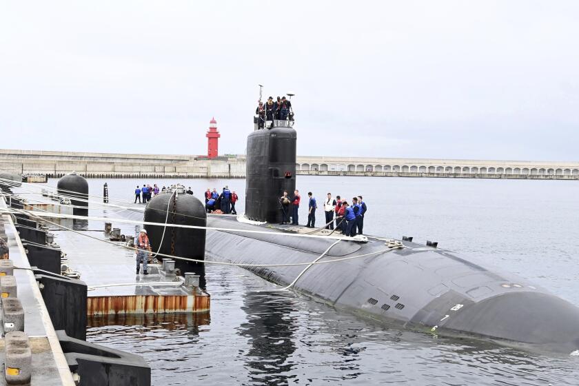 In this photo provided by South Korea Defense Ministry, the USS nuclear-powered submarine USS Annapolis docks at a South Korean naval base on Jeju Island, South Korea, Monday, July 24, 2023. The nuclear-propelled U.S. submarine has arrived in South Korea in the second deployment of a major U.S. naval asset to the Korean Peninsula this month, South Korea's military said Monday, adding to the allies' show of force to counter North Korean nuclear threats. (South Korea Defense Ministry via AP)
