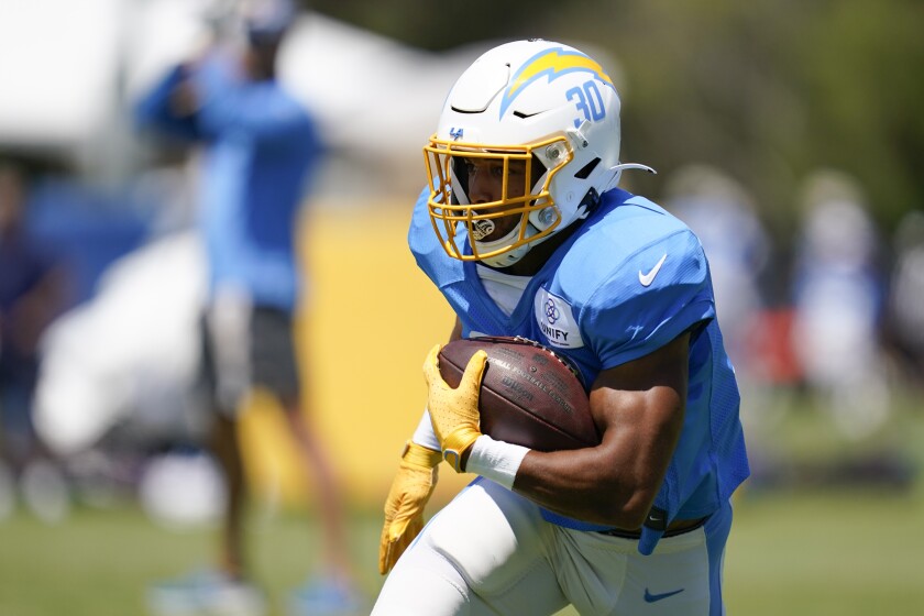 Chargers running back Austin Ekeler (30) participates in drills.