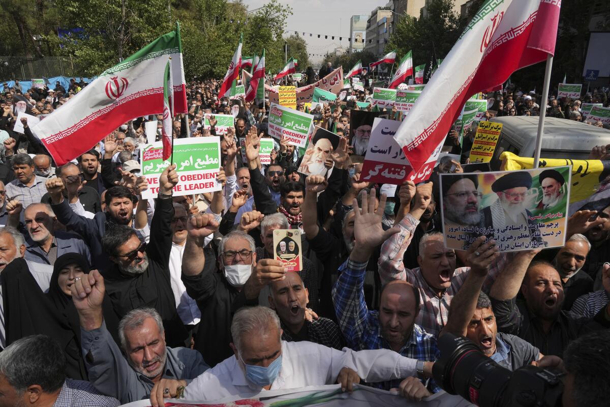 Pro-government demonstrators at a rally in Iran