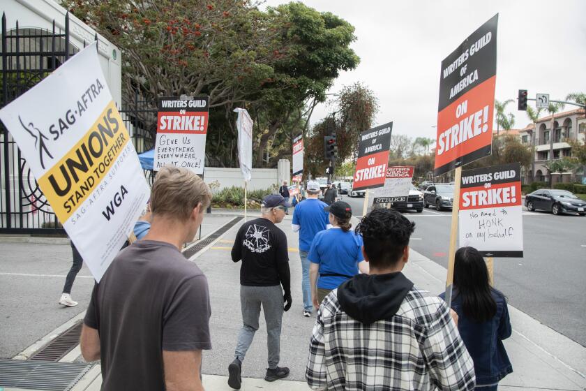 CULVER CITY, CA - MAY 09: Writers Guild of America, with support from SAG-AFTRA, picket at Sony Studios in Culver City on Tuesday, May 9, 2023 in Culver City, CA. (Myung J. Chun / Los Angeles Times)