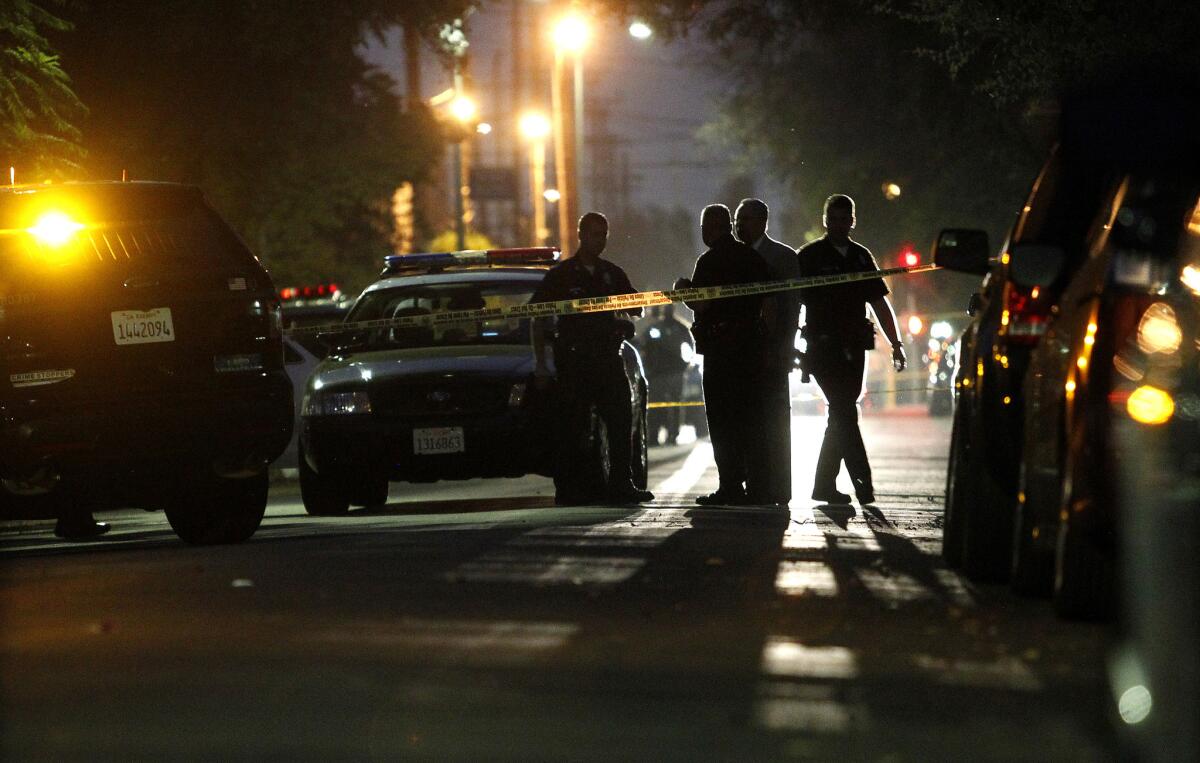 Los Angeles police investigate a shooting Tuesday evening near USC's campu.