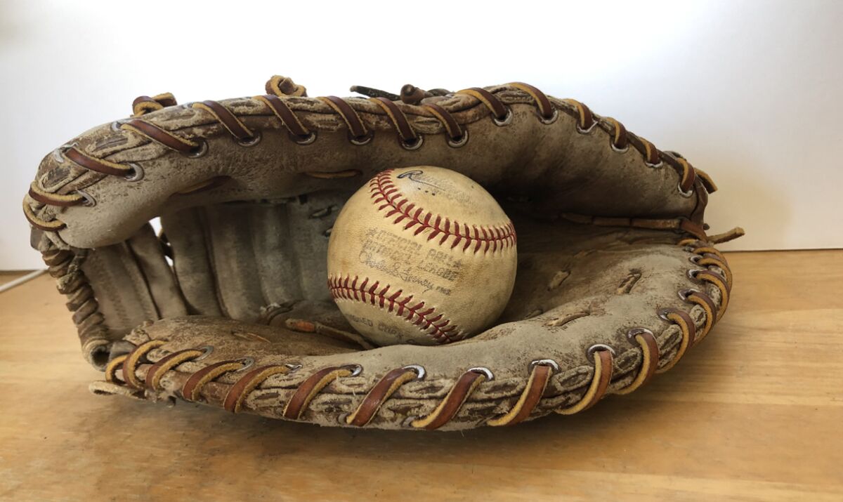 A baseball hit by former Padres pitcher Rollie Fingers during pregame warmups at San Diego Stadium found its way into this glove 42 years ago.