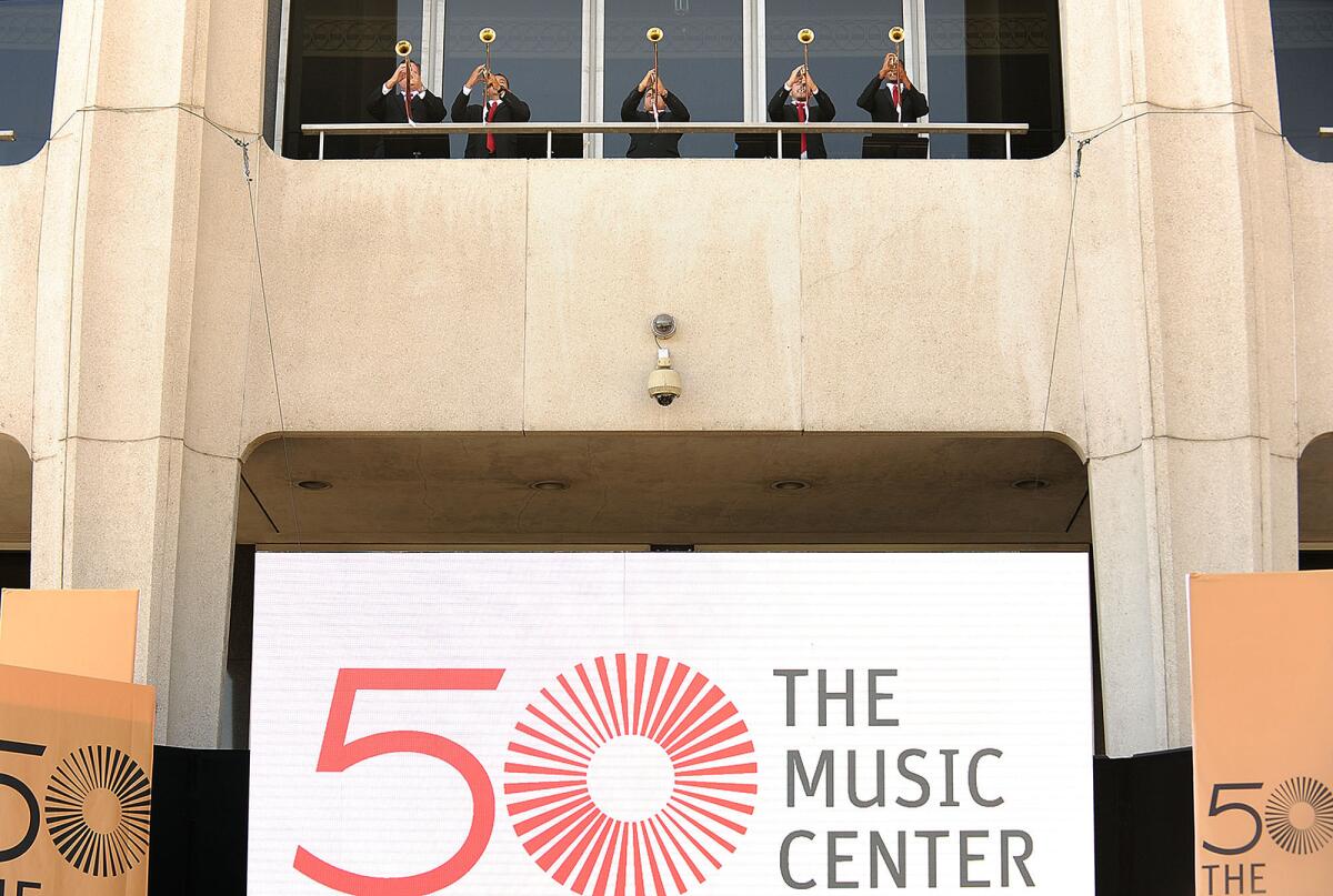 Trumpeters play during The Music Center's 50th Anniversary rededication ceremony in front of the Dorothy Chandler Pavilion.