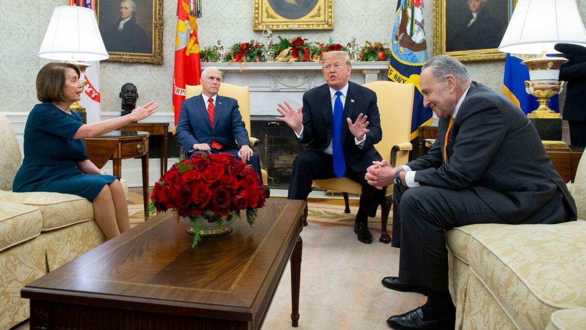 House Minority Leader Nancy Pelosi, Vice President Mike Pence, President Trump and Senate Minority Leader Charles E. Schumer in Tuesday's testy Oval Office meeting.