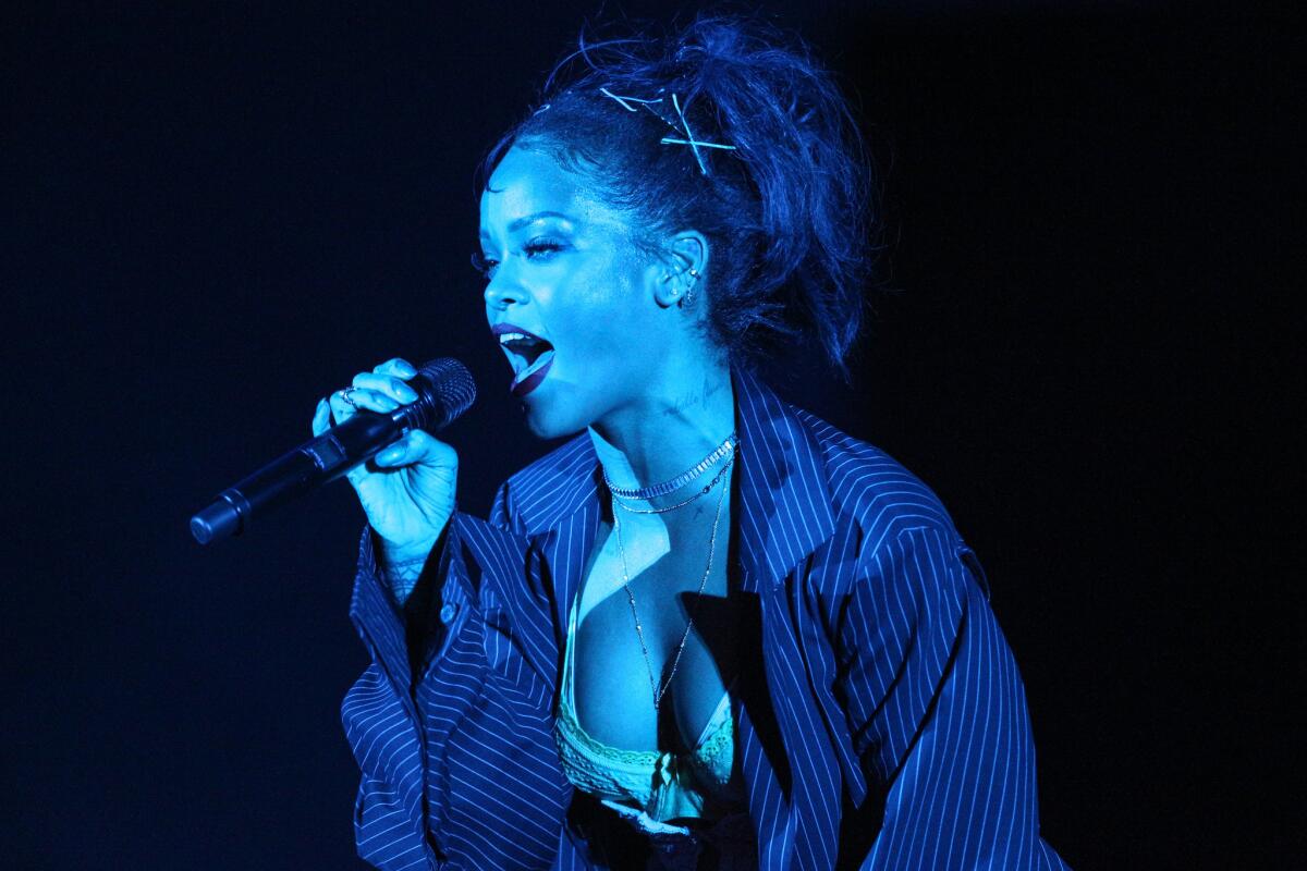 Rihanna performs at the We Can Survive Concert at the Hollywood Bowl on Saturday, Oct. 24, 2015, in Los Angeles. The singer released "Work," from her upcoming album "Anti" as a surprise on Wednesday.