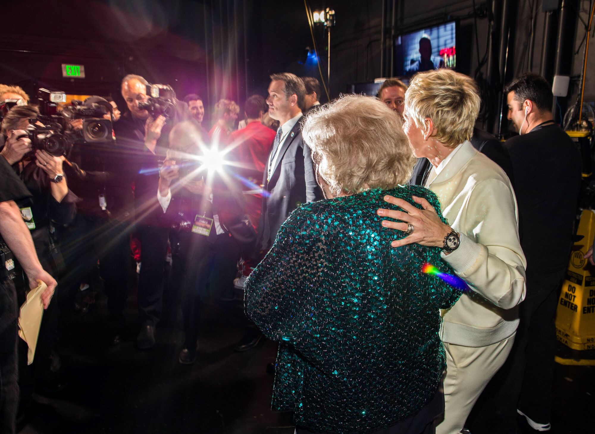Betty White, left and Ellen DeGeneres attend the 41st People's Choice Awards at Nokia Theatre L.A. Live.