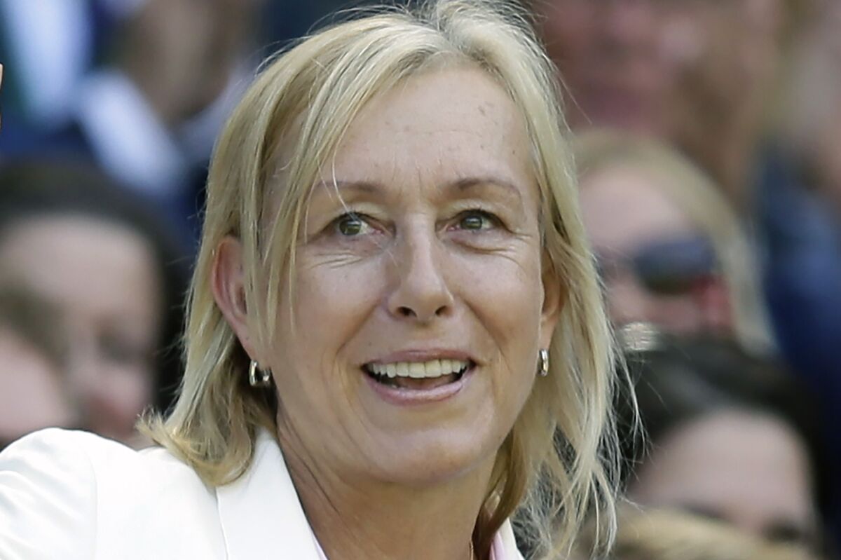 FILE - Tennis great Martina Navratilova is shown in the royal box on Centre Court at the All England Lawn Tennis Championships in Wimbledon, London, Saturday July 4, 2015. Navratilova says she has been told by doctors that, “as far as they know, I’m cancer-free,” and that she should be “good to go” after some additional radiation treatment. The 66-year-old Navratilova, an 18-time Grand Slam singles champion and member of the International Tennis Hall of Fame, discussed her health in an interview with Piers Morgan on TalkTV scheduled to be aired Tuesday, March 21, 2023.(AP Photo/Tim Ireland, File)